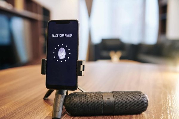 How can the implementation of a Bluetooth speaker system in the kitchen aid in calorie burning through music and dance?